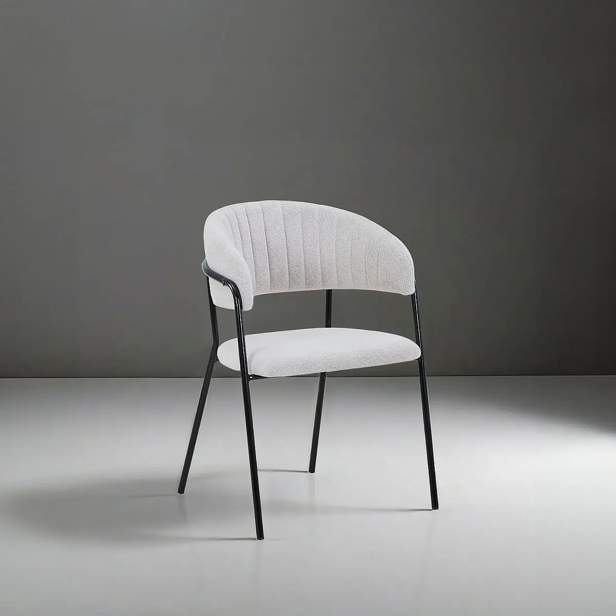 Sillón Leonor tapizado en tela resistente al agua