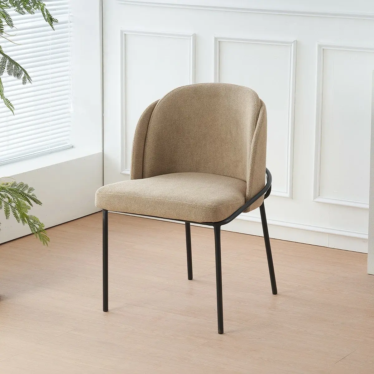 Sillón Candela tapizado en tela resistente al agua