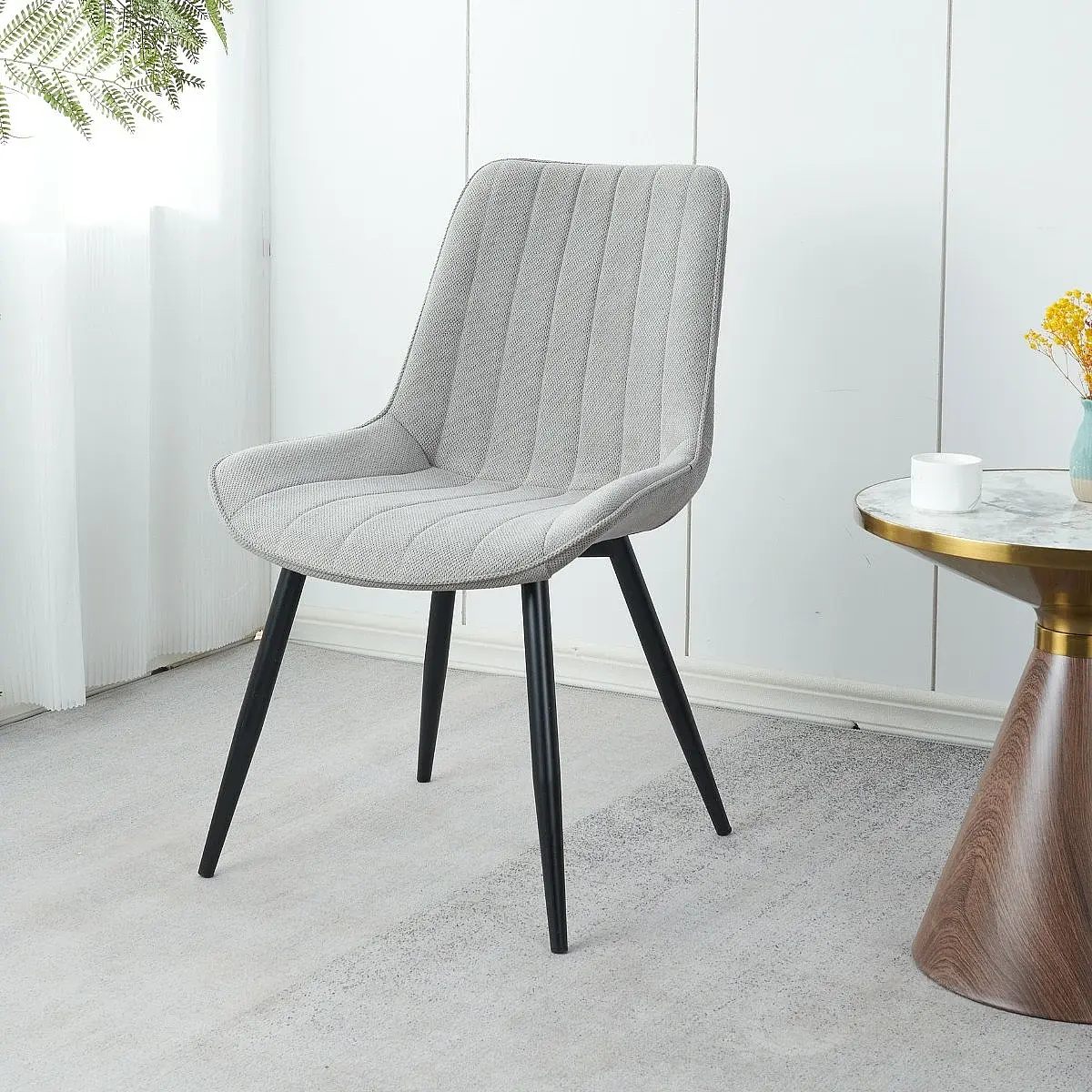 Silla Brisa tapizada en tela resistente al agua